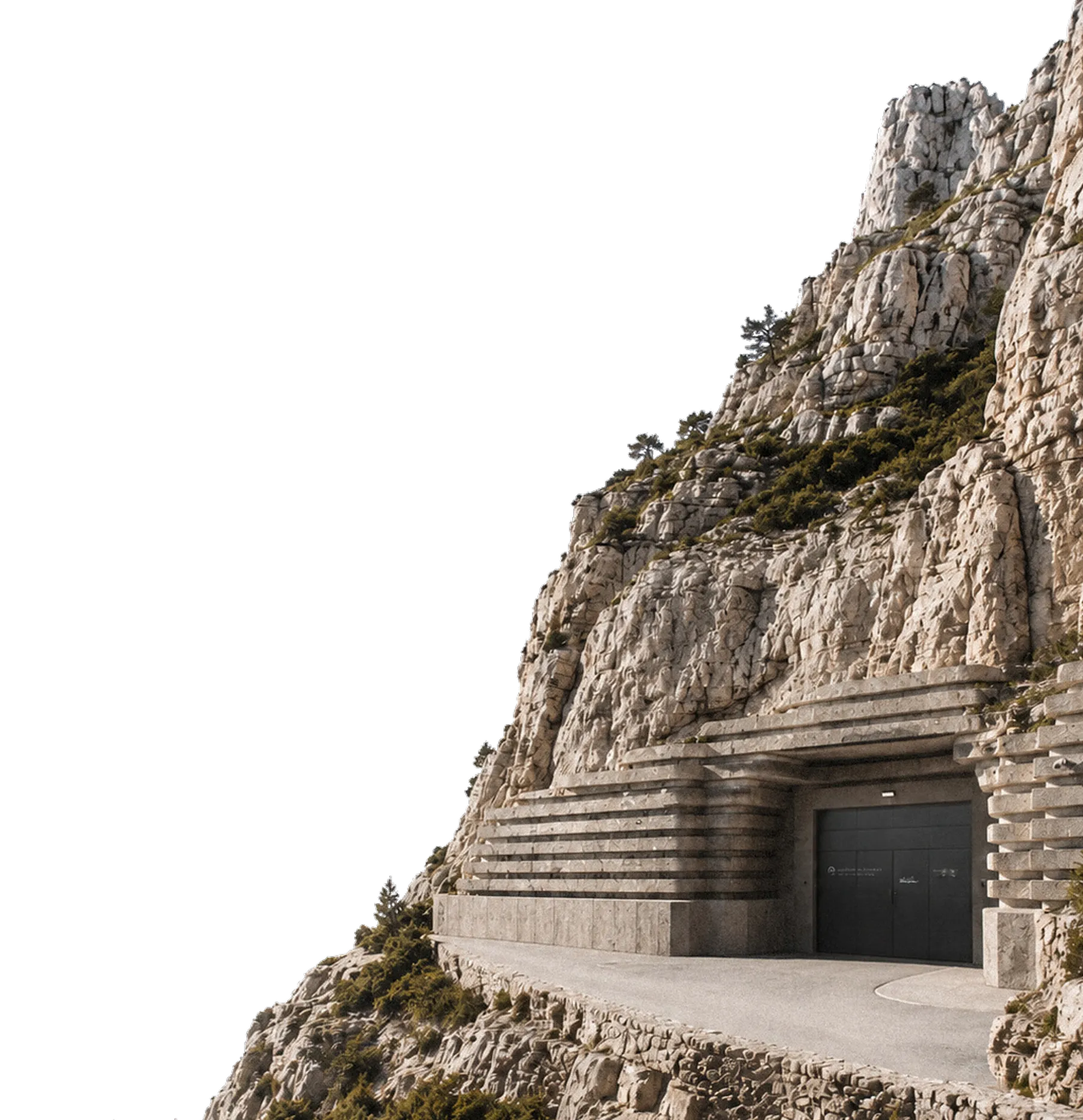 Camouflaged mountain bunker entrance built into rock